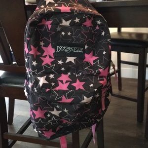 Jansport black stars and pink stars backpack